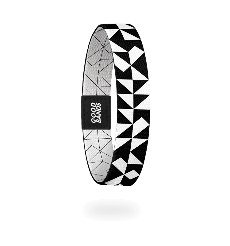 timeless - elastisches Stoffarmband in schwarz und weiß geometrischem Dreiecksmuster und Streifen, freigestellte Innenseite