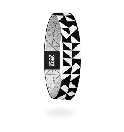 timeless - elastisches Stoffarmband in schwarz und weiß geometrischem Dreiecksmuster und Streifen, freigestellte Innenseite