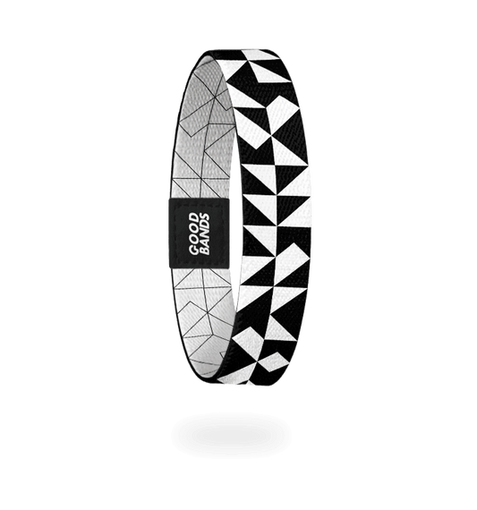 timeless - elastisches Stoffarmband in schwarz und weiß geometrischem Dreiecksmuster und Streifen, freigestellte Innenseite